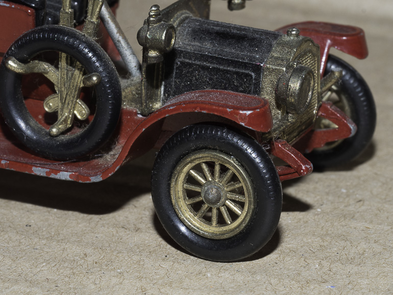 toy car taken with flash mounted on the camera hot-shoe